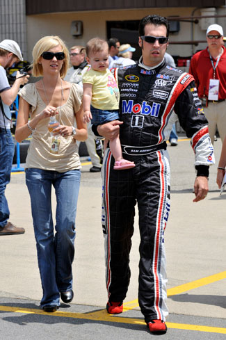 Crystal and Sam Hornish in 2009 with daughter Addison